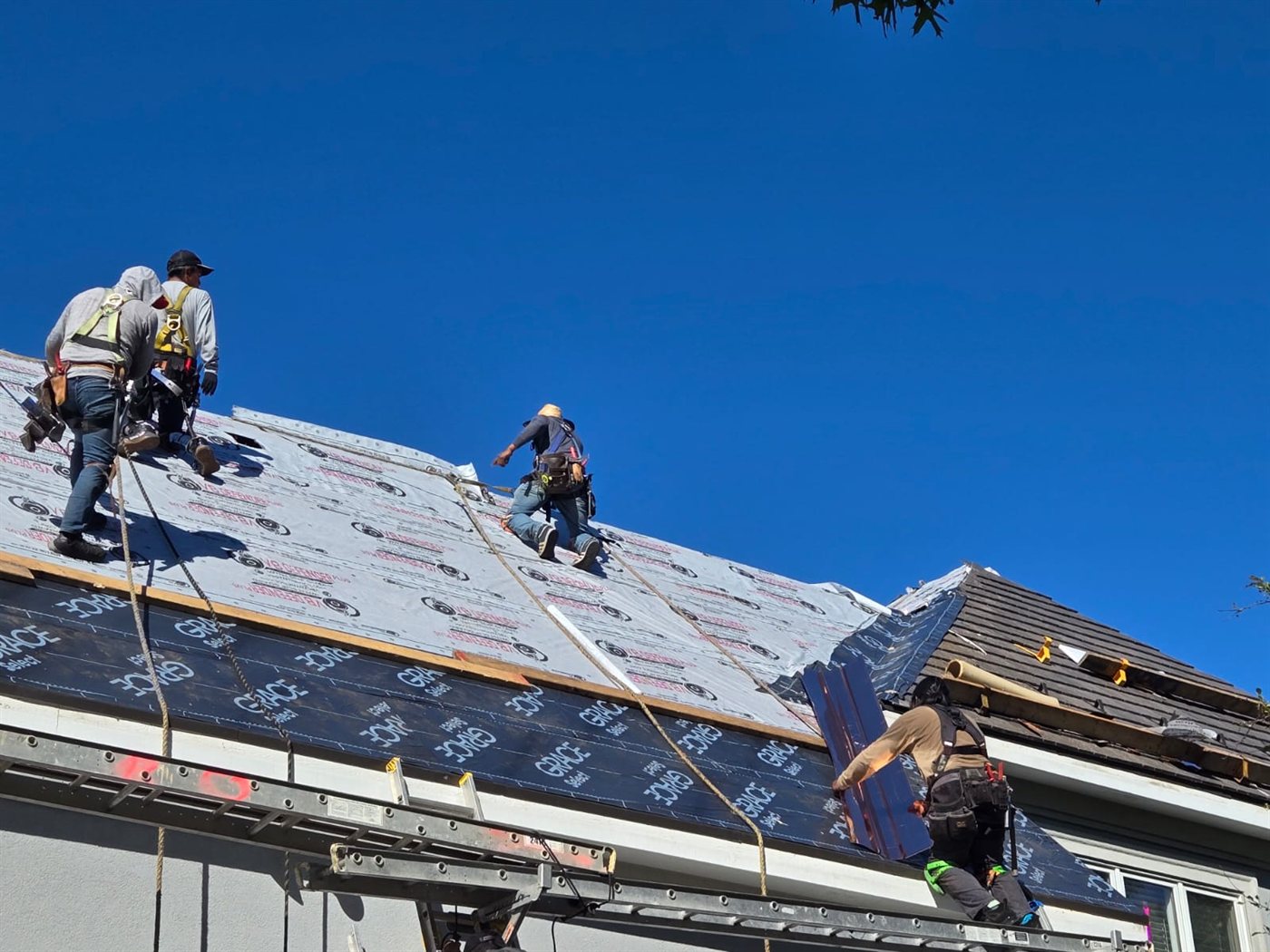Steep-slope roof install in progress