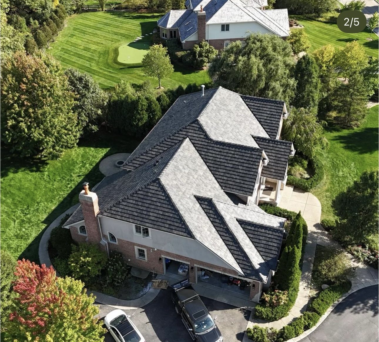 Financing 1 Aerial view of a completed roof on a large home in the Chicago suburbs