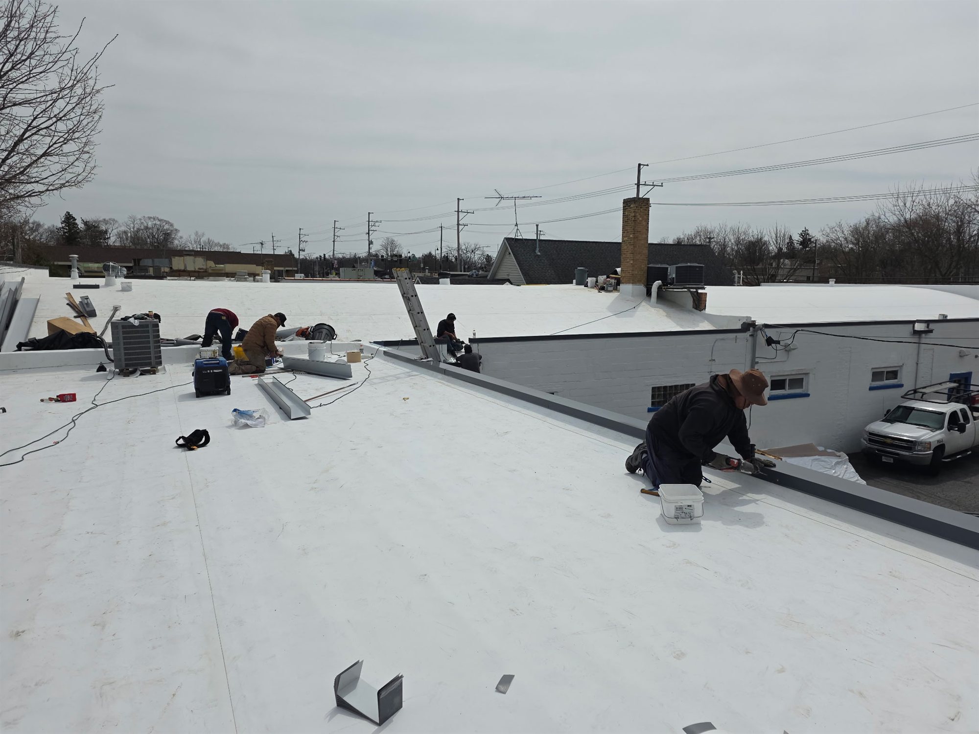 RX crew working on a home exterior in Hoffman Estates