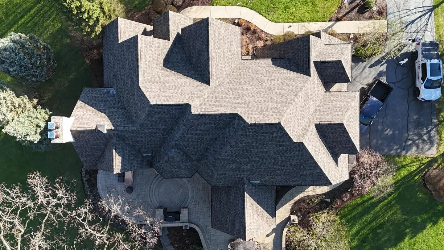Finished architectural asphalt shingle roof replacement seen from directly above